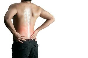 Young man holding back pain bone spine on a white background photo