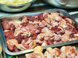 chicken internal organsliver, gut heart in the market photo