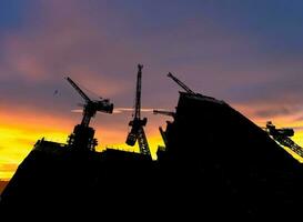 Silhouette building construction bar at the construction site and industrial concept photo