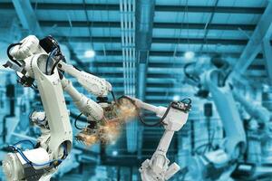 Robotic arms, industrial robots, factory automation machines photo
