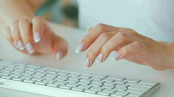 Woman typing credit card number on computer keyboard. She making online purchase. Online payment service video