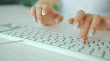 Woman typing credit card number on computer keyboard. She making online purchase. Online payment service video