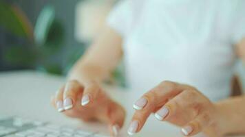 Woman typing credit card number on computer keyboard. She making online purchase. Online payment service video