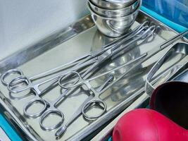 Surgical instruments in the preparation tray of the operating room photo