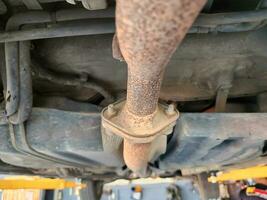 car exhaust pipe a rusty iron old pipe photo