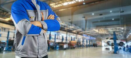 Auto mechanic in the auto service center car photo