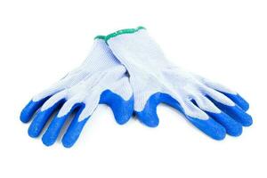azul guantes en un blanco antecedentes foto