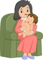 a happy mother is sitting on a green sofa holding her baby boy vector