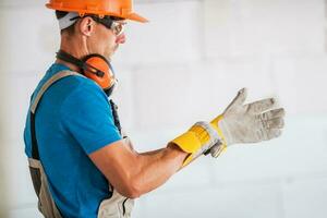 Worker Wearing Safety Gloves photo