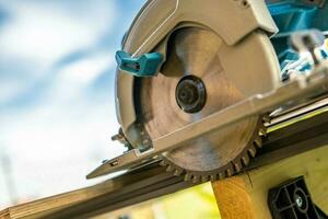 Circular Handheld Wood Saw Close Up photo