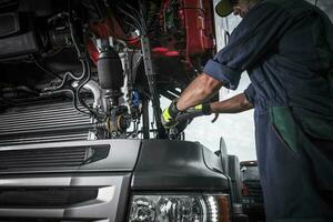 Repairing Broken Semi Truck photo