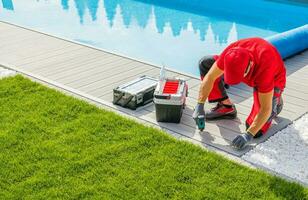 Pool Specialist Installing the Composite Deck photo