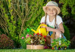 Girl Taking Care of Garden photo