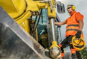 Heavy Duty Road Construction Machinery Caucasian Operator photo