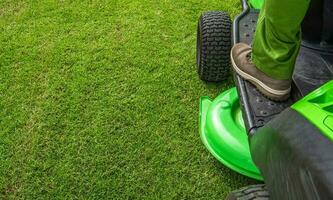 Professional Grass Mowing Backdrop with Copy Space photo