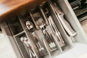 Silverware Set in a Drawer photo