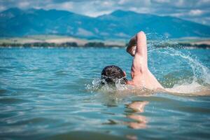 Men Swimming in a Lake photo