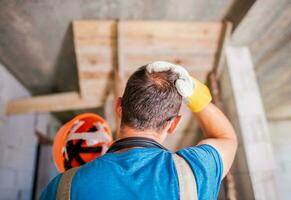 Worker Wearing Hard Hat photo