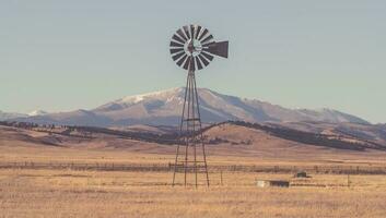 Aged Windmill in Colorado photo