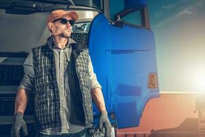 Blue Semi Truck Driver photo