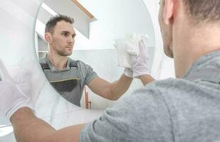 Cleaning Bathroom Mirror photo