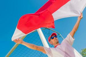 Soccer Fan with the Flag photo