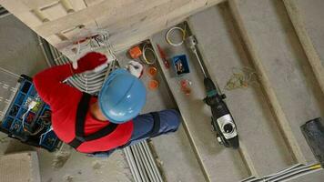 Contractor Electrician Worker Drilling Electric Outlets Holes video