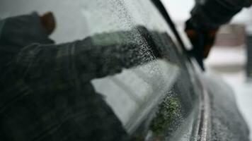 Close Up of Car Side Windows Cleaning From Snow and Ice video