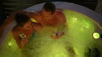 Couple in Their 40s Spending Romantic Time Inside a Garden Hot Tub video