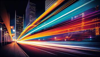 Night traffic speeds through the illuminated cityscape , photo