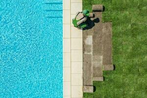 Landscaper Worker Finishing Grass Field photo