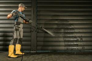 Modern Aluminium Pergola Power Washing Using Pressure Washer photo