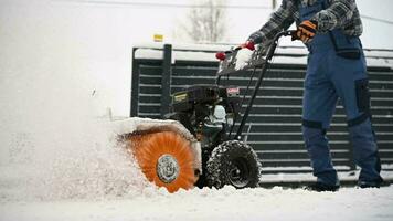 Driveway Snow Removal with Gasoline Brush Broom video