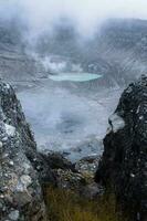 View of the beautiful white crater of Mount Tangkuban Parahu from the point of view of the stone frame photo