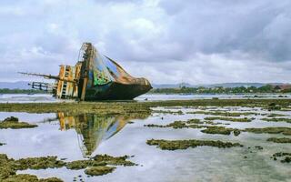 A foreign ship that was sunk on Pangandaran beach due to illegal fishing photo