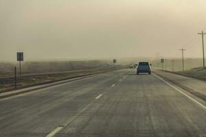Fog Ahead Highway Driving photo