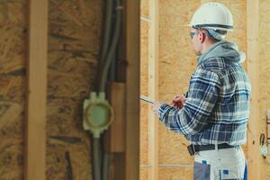 Construction Site Supervisor Filling Project Schedule Documentation photo