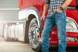 Truck Driver with Keys To His Brand New Semi Truck photo