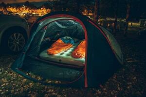 Illuminated Tent on Campsite photo