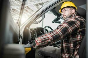 Construction Supervisor Inside His Pickup Truck photo