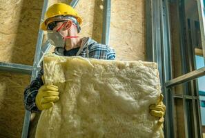 Worker with Wool Insulation photo