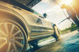 Men Washing Modern Car photo