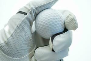 Golf Ball in Hand of a Player photo