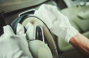 Cleaning Car Steering Wheel photo