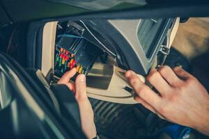 Checking Car Fuses photo