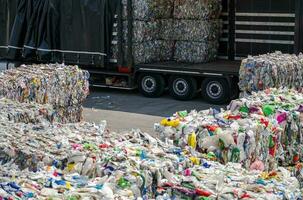 Piles of Plastic Recycling Material Going to Recycling Facility photo