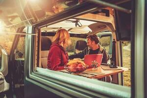 Boondocking Camping Inside Modern RV Camper Van photo