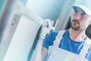 Builder Worker with Scaffolding photo