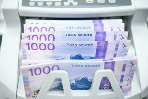 Norwegian Kroner Banknotes Inside Bill Counter photo