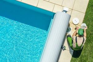 Outdoor Backyard Garden Swimming Pool Maintenance. photo